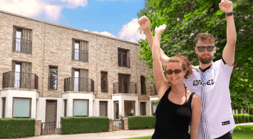 Tom & Ellie from Bristol celebrating outside their new home