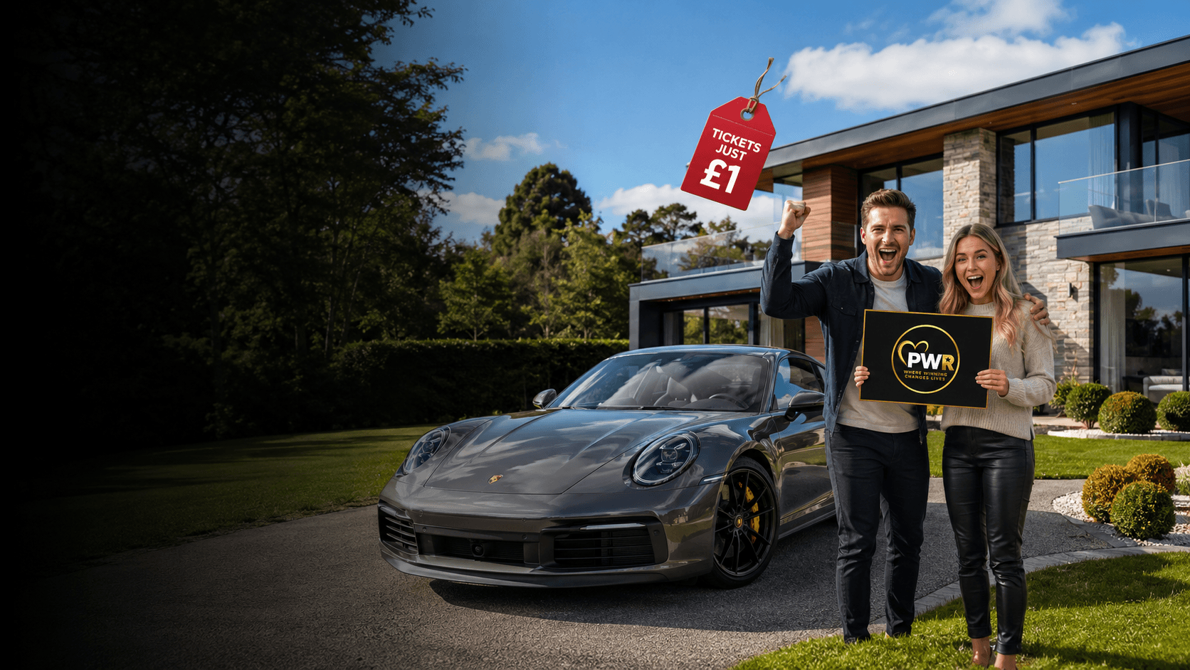 Winners posing with their prize Porsche